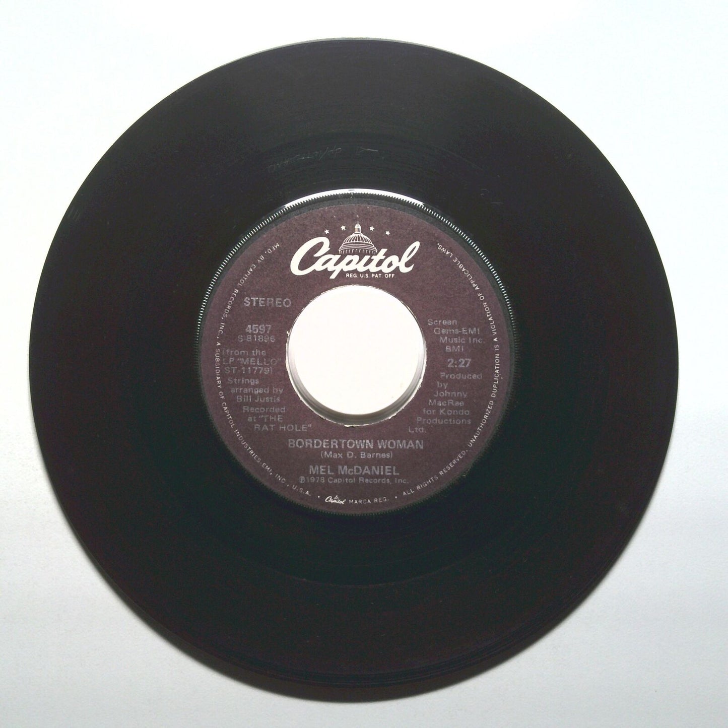 Mel McDaniel - The Grandest Lady Of Them All; Bordertown Woman - Vinyl 45 RPM