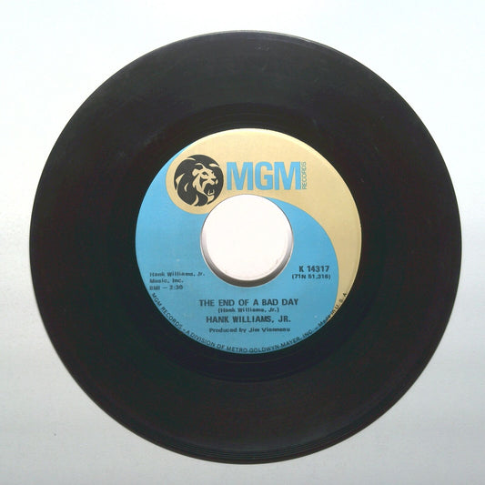 Hank Williams, Jr. - The End Of A Bad Day; Ain't That A Shame - 45 RPM 7"