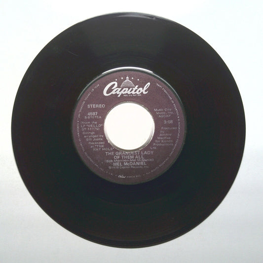 Mel McDaniel - The Grandest Lady Of Them All; Bordertown Woman - Vinyl 45 RPM